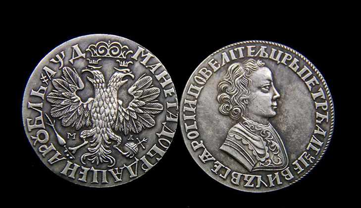 Петровский серебряный рубль 1704 года